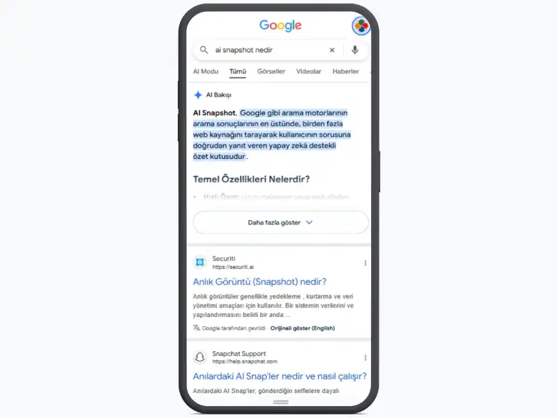 Akıllı telefon ekranında Google yapay zeka özet kutucuğunu (AI Snapshot) gösteren arama sonucu ekranı görseli
